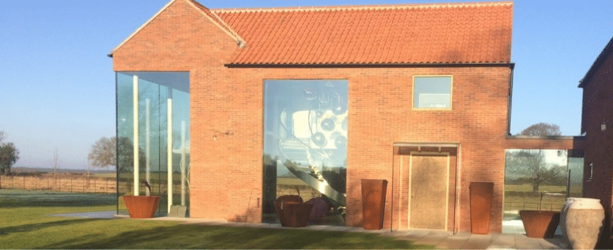 Case Study: How Struct-Sure Limited Designed a House with 18ft high Glazed Windows